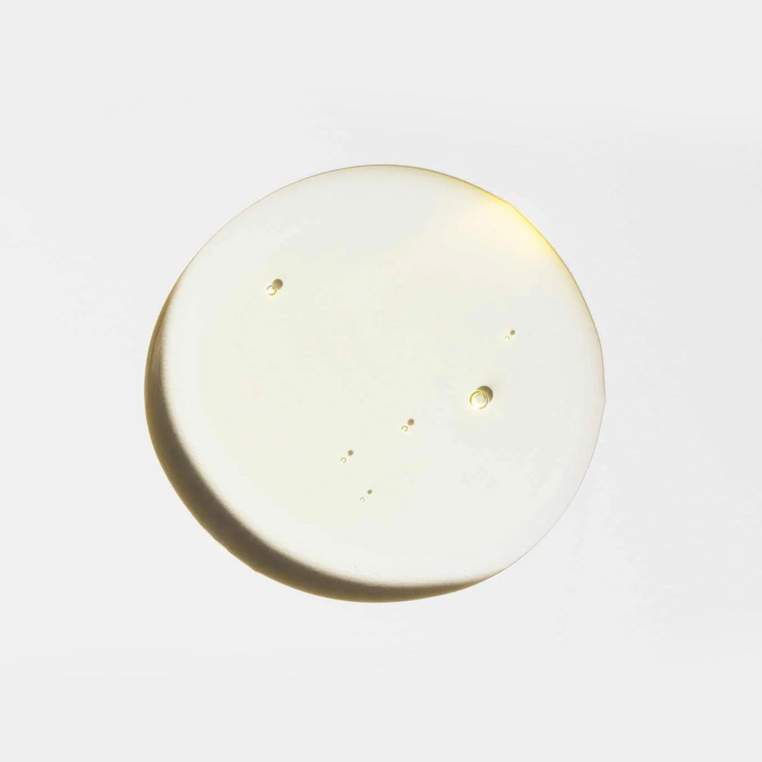 The Full Monty hydrating vitamin C body oil drop showing silky texture and deep moisturizing properties