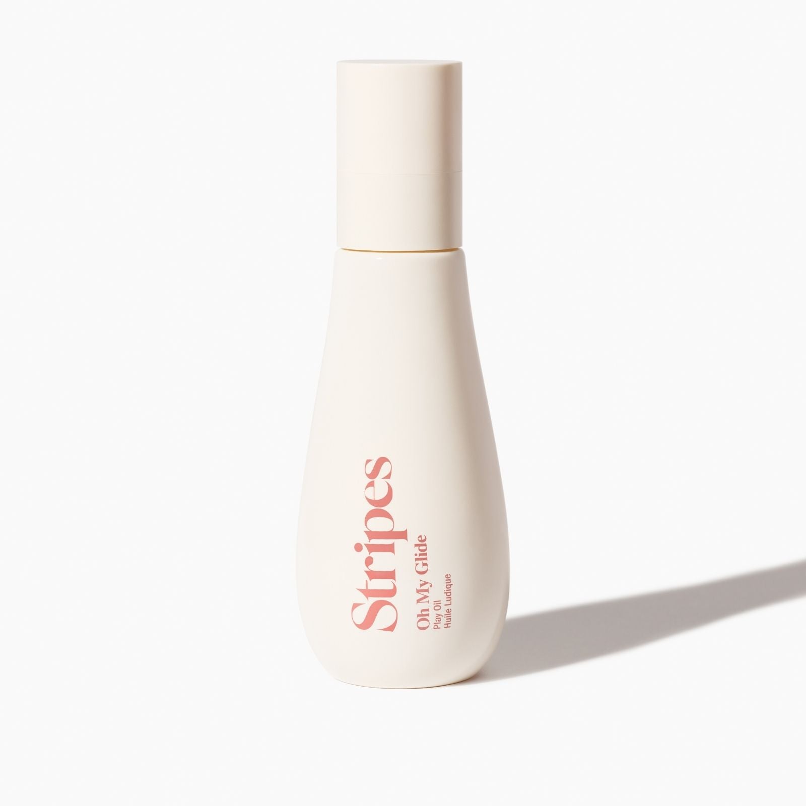 Oh My Glide bottle with 'Stripes' branding on a light grey background