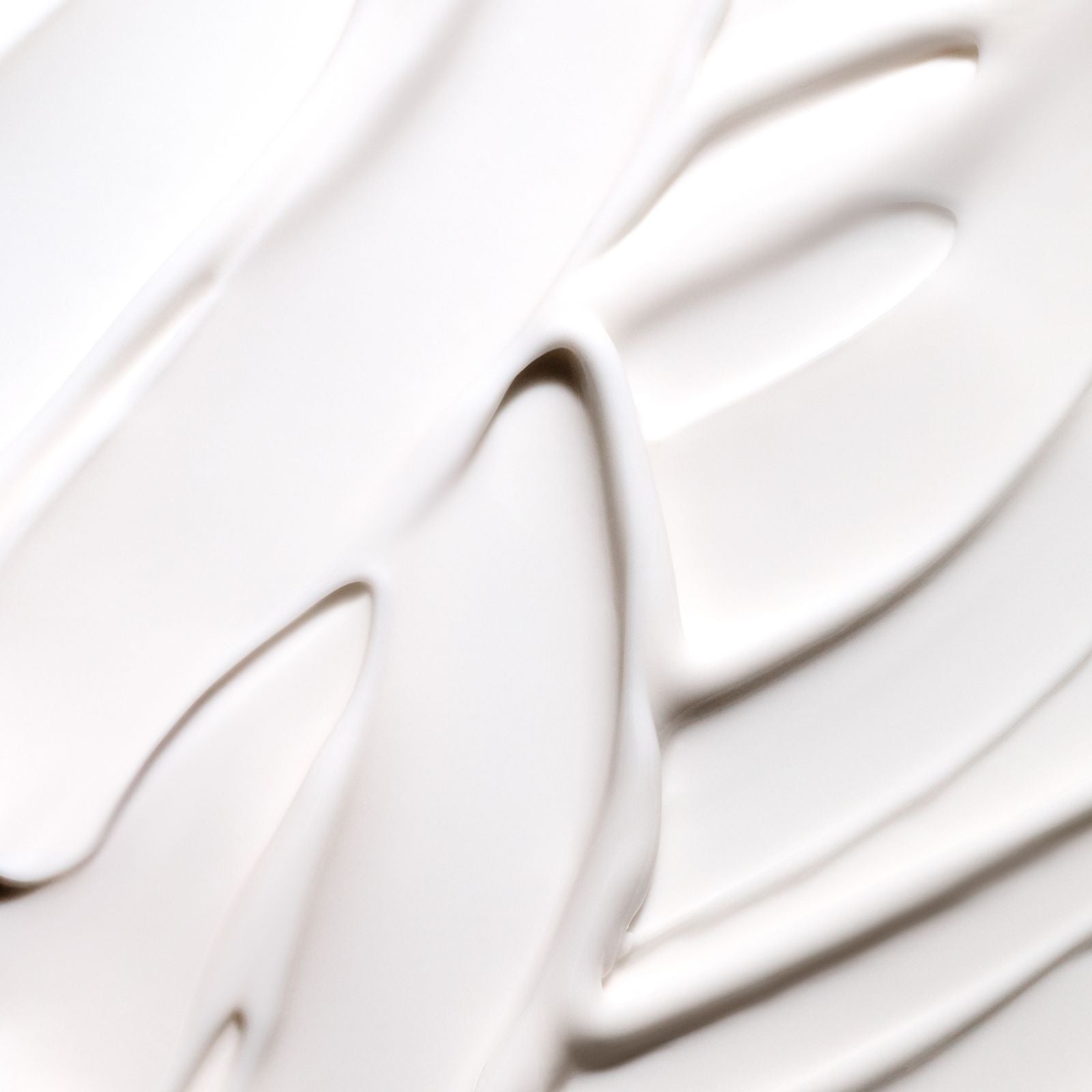 an image showing the creamy texture of of Rich & Tight firming body butter 
