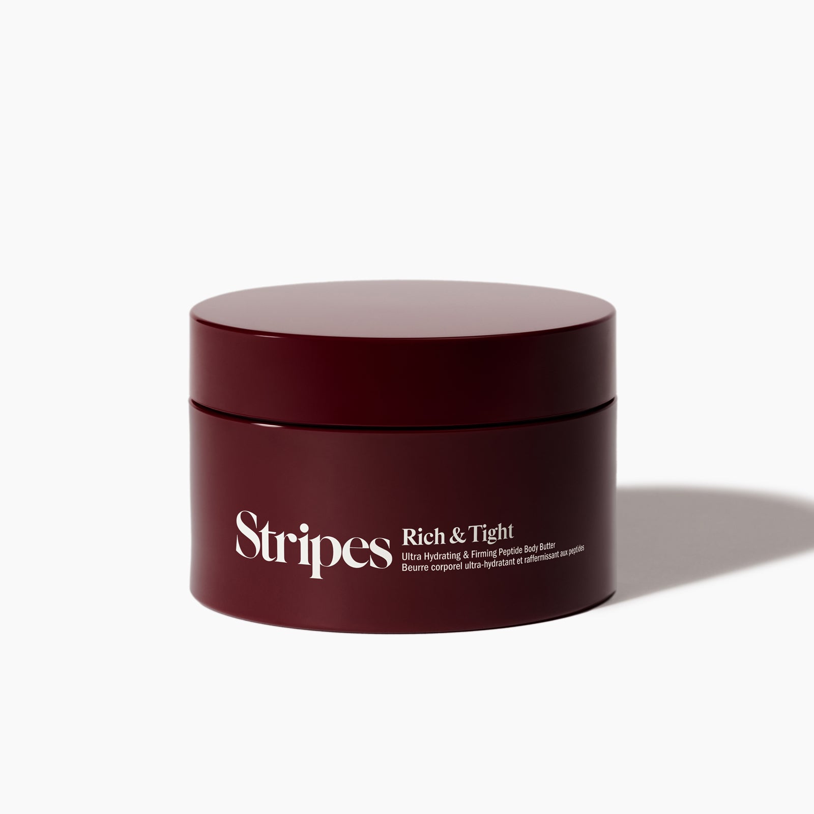 a jar of Rich & Tight firming body butter
