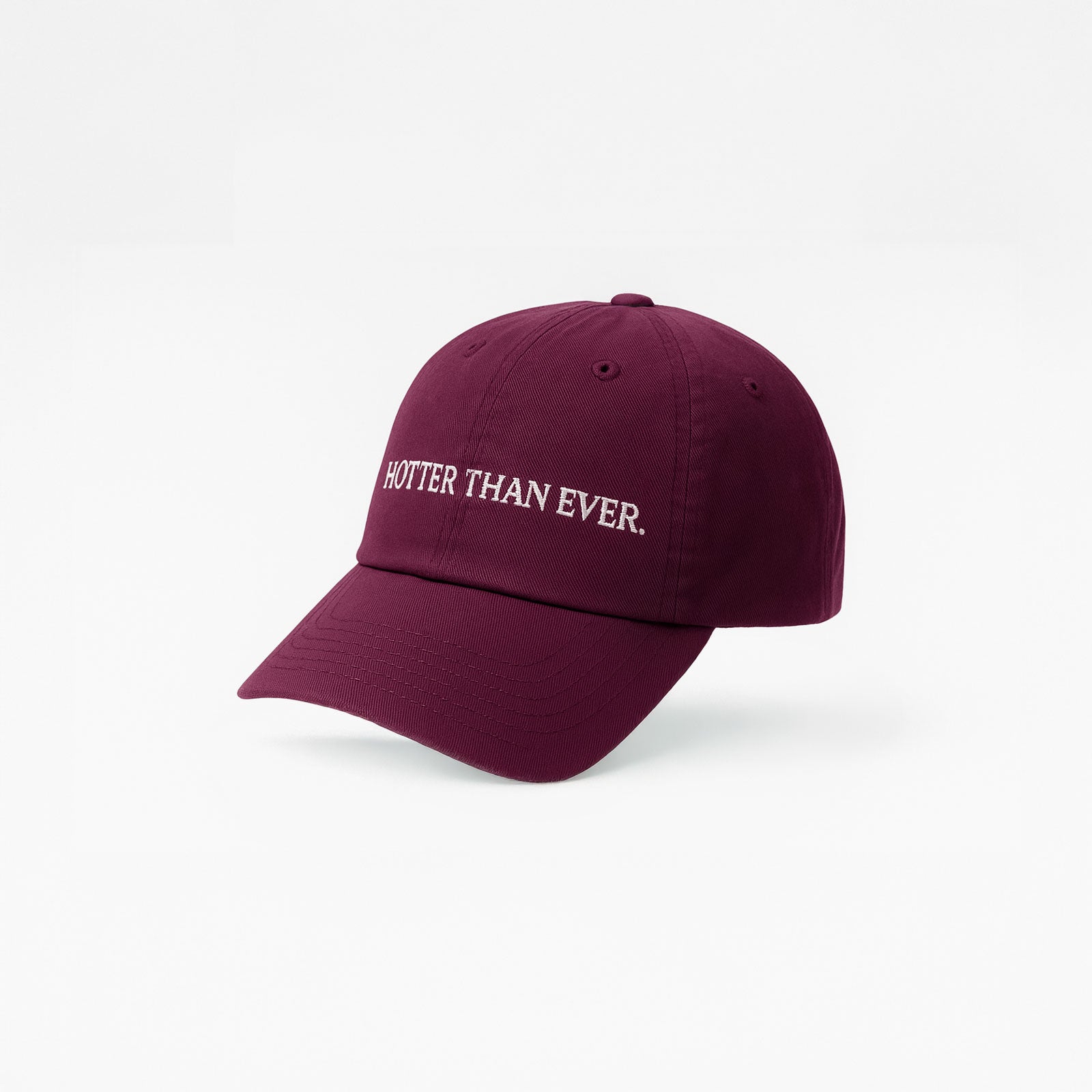 Maroon cap with 'HOTTER THAN EVER' text on a white background